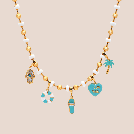 audacious necklace in white, product image with charms